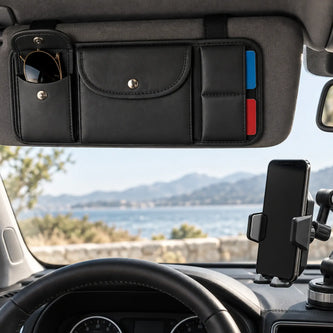 Passive car accessories including a phone mount and sun visor organizer in a clean vehicle interior.