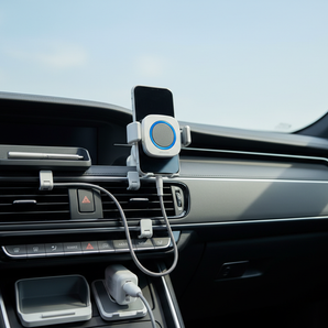 Clean car dashboard setup with magnetic phone mount, car charger, cable clips, phone holder, and organized cables.
