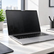 Magnetic privacy screen installed flush on a compatible MacBook display