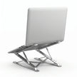 Laptop supported at an elevated angle on a foldable aluminum laptop stand.