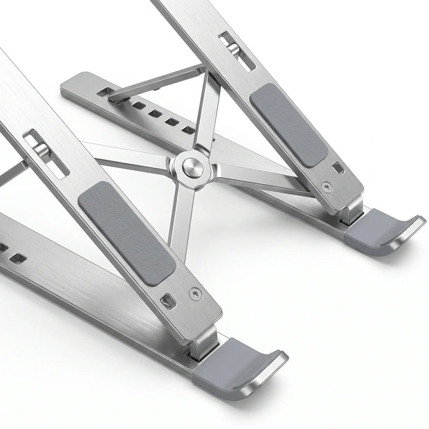 Close-up of silicone pads, retaining hooks, hinges, and aluminum construction on laptop stand.