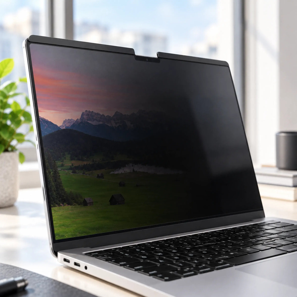 Close-up of matte magnetic MacBook privacy screen surface in bright ambient light