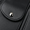 Close-up of black faux-leather texture, clean stitching, rounded piping, and metal snap closure